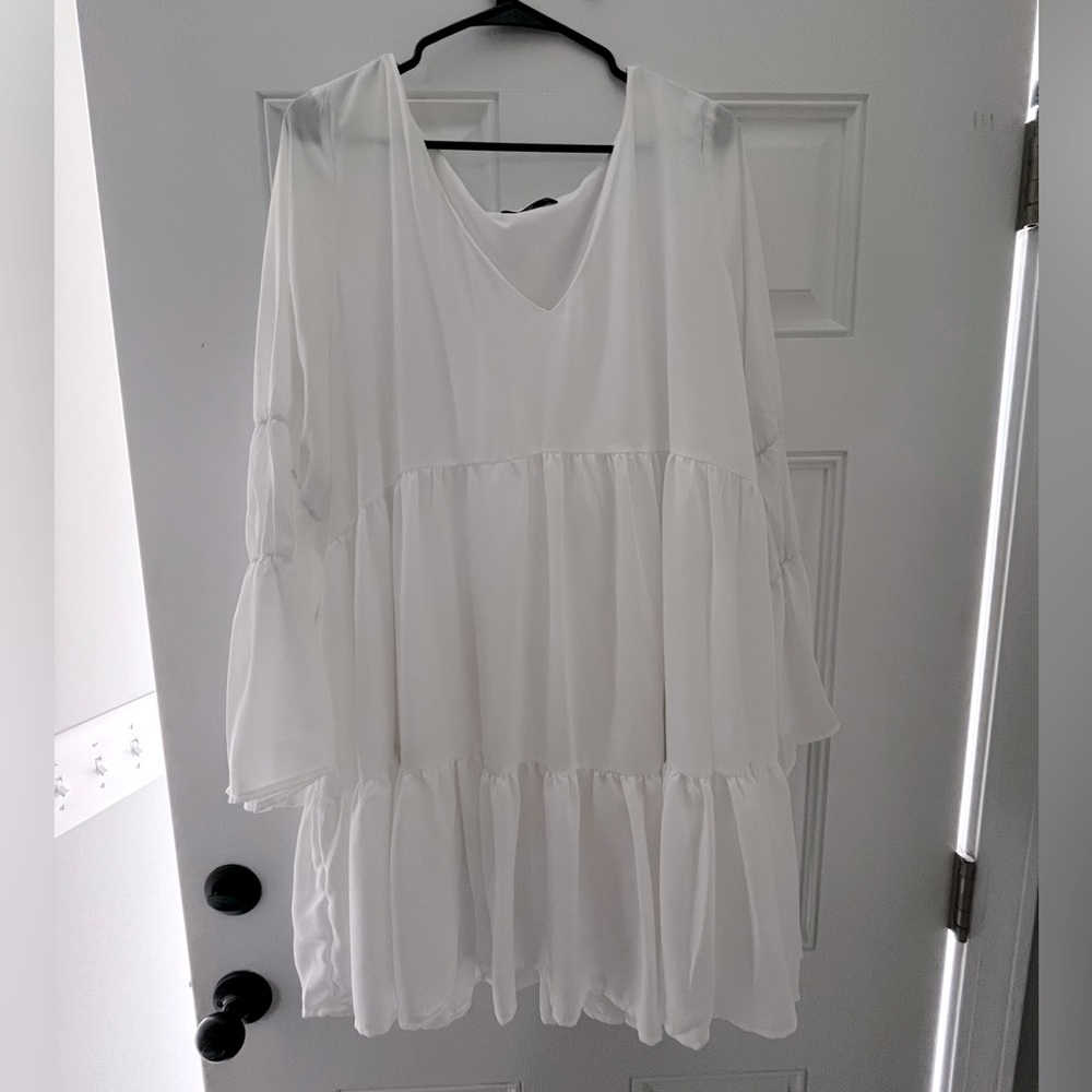 White Trumpet Sleeve Ruffle Hem Smock Dress